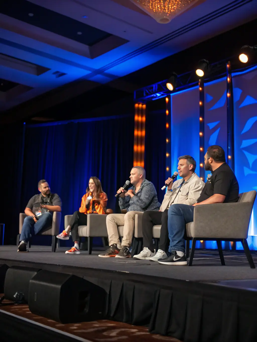 A dynamic image of a panel discussion featuring industry experts debating the future of food technology, capturing the energy and insights shared during the session.